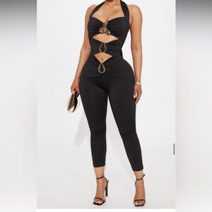 Chic Black Cutout Jumpsuit with Gold Accents